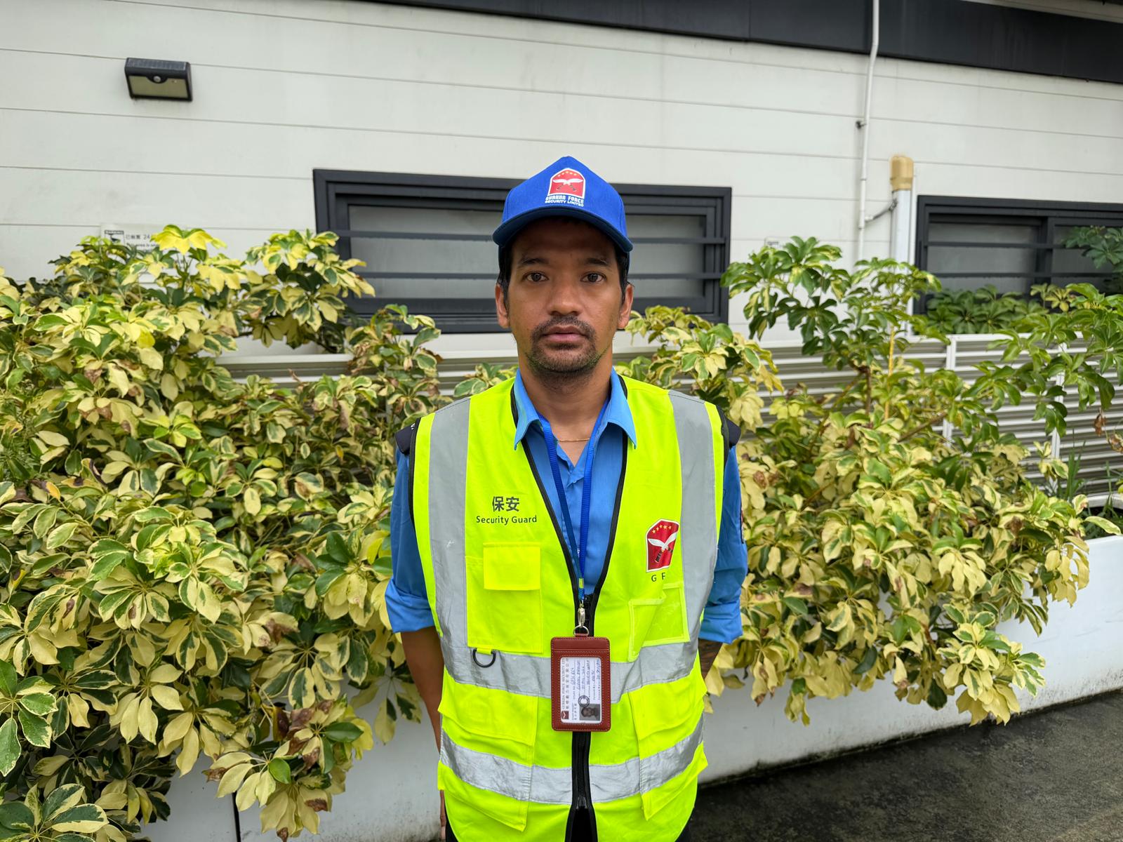 GFSL security officer in high-visibility site uniform